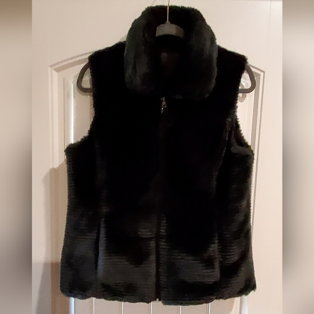 Black reversible vest